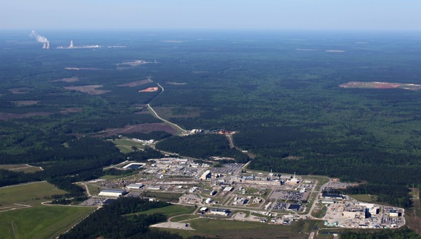 The Savannah River Site, with the unfinished MOX facility in the foreground. In the background is Georgia's Vogtle reactor complex, where two new reactors are under construction. With the likely demise of the MOX project, their power won't be needed at SRS. Photo by High Flyer, special to SRS Watch.